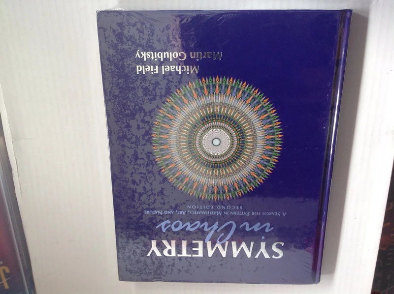 Symmetry in Chaos: A Search for Pattern in Mathematics, Art and Nature