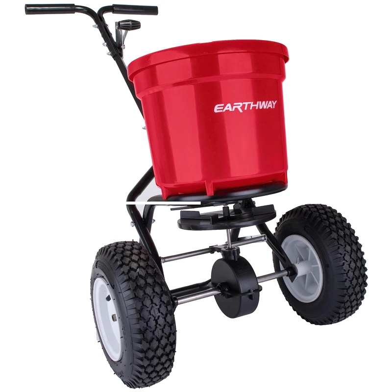 EarthWay 2150 22 KG Commercial Broadcast Fertiliser Spreader. Red, Heavy-Duty Walk-Behind Push Garden Seeder and Spreader with Adjustable Drop Rate and Driving Handle. Large 33 CM Pneumatic Stud Tires