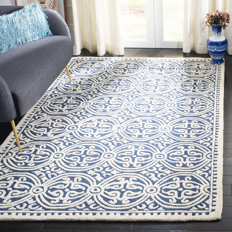 Safavieh Medallion Indoor Hand Tufted Rectangle Area Rug, Cambridge Collection, CAM123, in Navy Blue / Ivory, 122 X 183 cm for Living Room, Bedroom or Any Indoor Space - Image 1