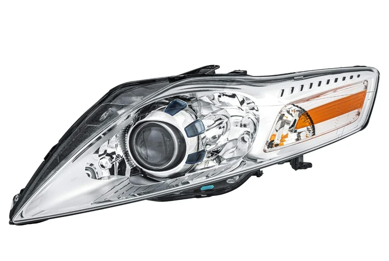 HELLA 1ZL 010 541-071 DE/Halogen-Headlight - ECE - for left-hand traffic - Left Front