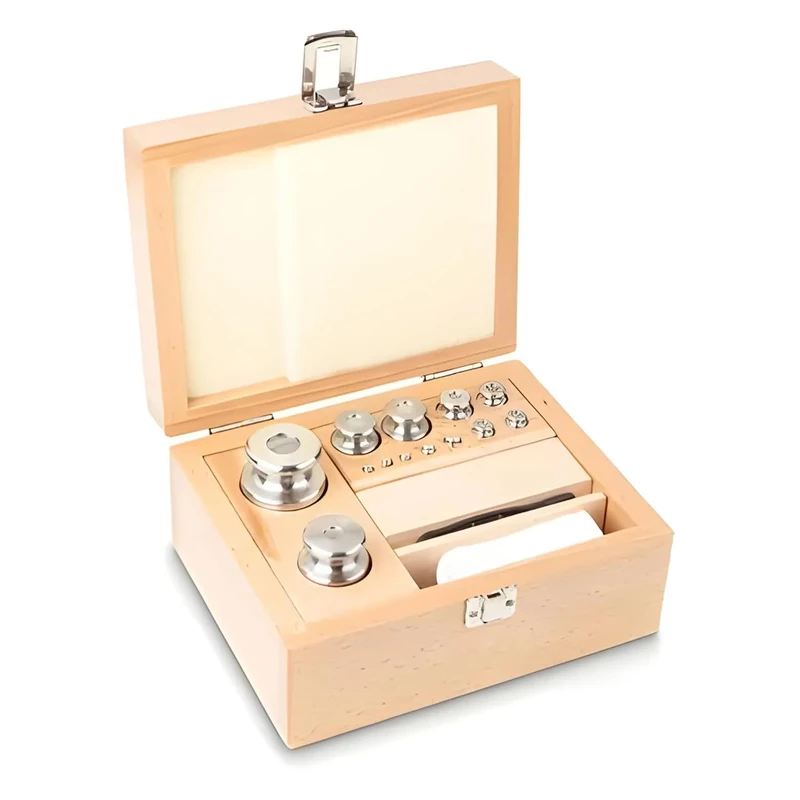 M1 1 G - 1 Kg Set Of Weights In Wooden Box, Finely Turned Stainless Steel - Image 1