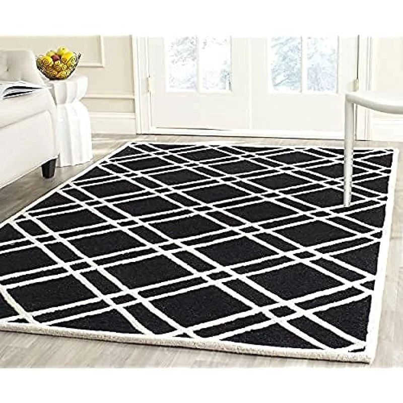 Safavieh Modern Indoor Hand Tufted Rectangle Area Rug, Cambridge Collection, CAM142, in Black / Ivory, 152 X 244 cm for Living Room, Bedroom or Any Indoor Space