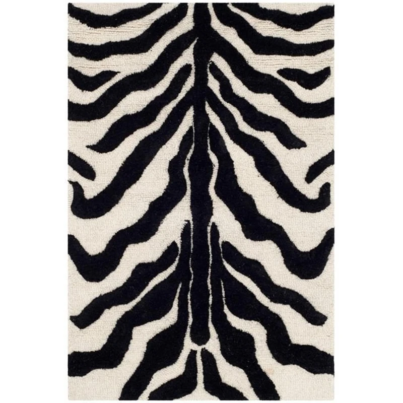 Safavieh Zebra Indoor Hand Tufted Rectangle Area Rug, Cambridge Collection, CAM709, in Ivory / Black, 91 X 152 cm for Living Room, Bedroom or Any Indoor Space