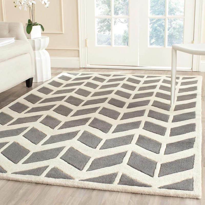 Safavieh Contemporary Indoor Hand Tufted Rectangle Area Rug, Chatham Collection, CHT746, in Dark Grey / Ivory, 122 X 183 cm for Living Room, Bedroom or Any Indoor Space