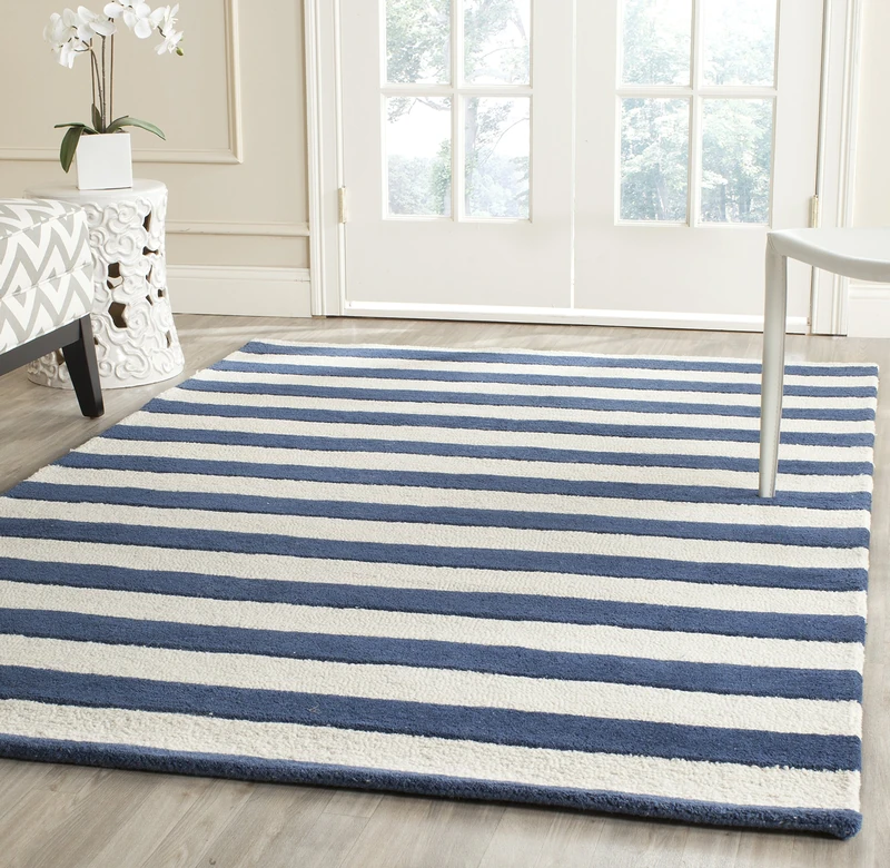 Safavieh Modern Indoor Hand Tufted Rectangle Area Rug, Cambridge Collection, CAM154, in Navy / Ivory, 91 X 152 cm for Living Room, Bedroom or Any Indoor Space