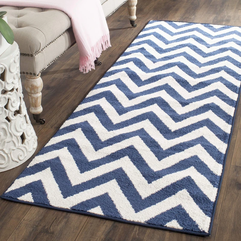 Safavieh Chevron Indoor/Outdoor Woven Runner Area Rug, Amherst Collection, AMT419, in Navy / Beige, 69 X 213 cm for Garden, Patio or Any Outdoor Space - Image 1