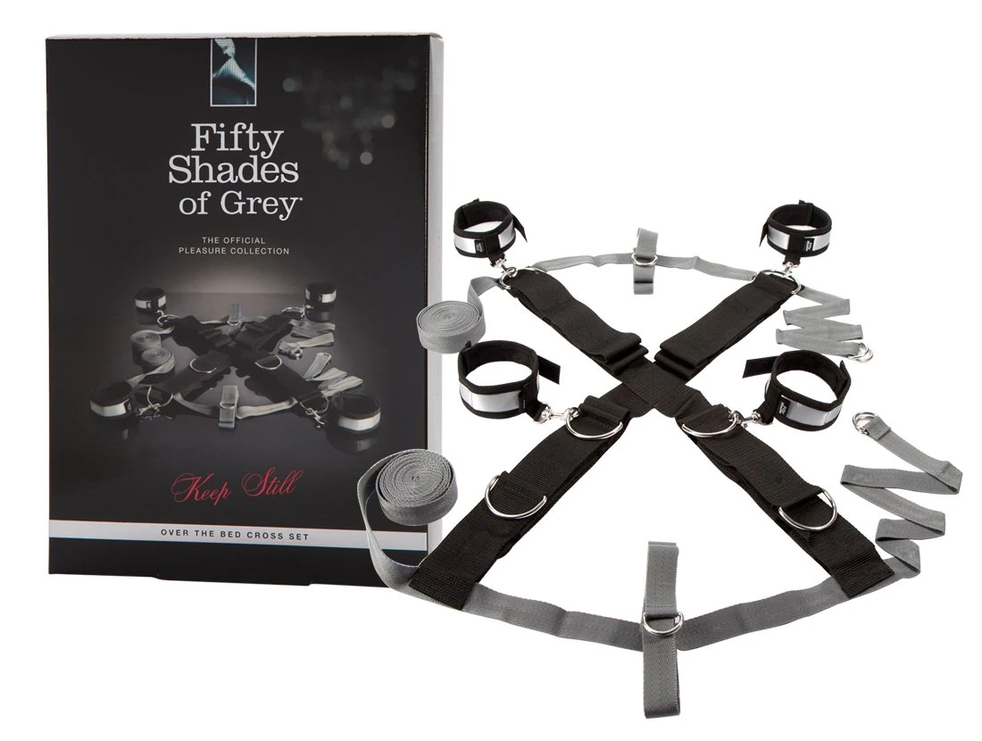 Fifty Shades of Grey Keep Still Restraint Kit - Over The Bed Cross Restraint Set - Faux Fur Lined Detachable Cuffs - Includes Blindfold & Door Hanger - 80 Inch Adjustable Bondage - Black/Grey