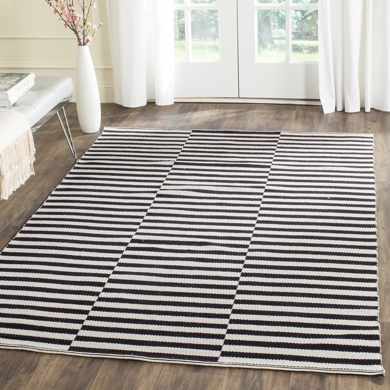 Safavieh Modern Indoor Flatweave Rectangle Area Rug, Montauk Collection, MTK715, in Ivory / Black, 152 X 213 cm for Living Room, Bedroom or Any Indoor Space