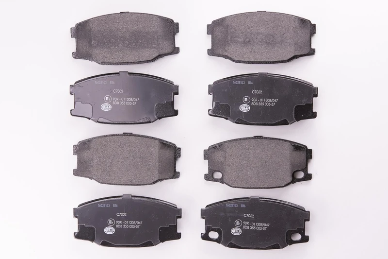 HELLA 8DB 355 005-571 Brake pad set - prepared for wear indicator - C7002 - for e.g. MITSUBISHI