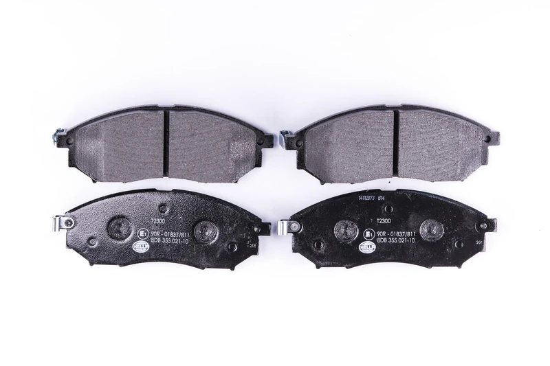 HELLA 8DB 355 021-101 Brake pad set - with acoustic wear warning - T2300 - for e.g. INFINITI / NISSAN - Image 1