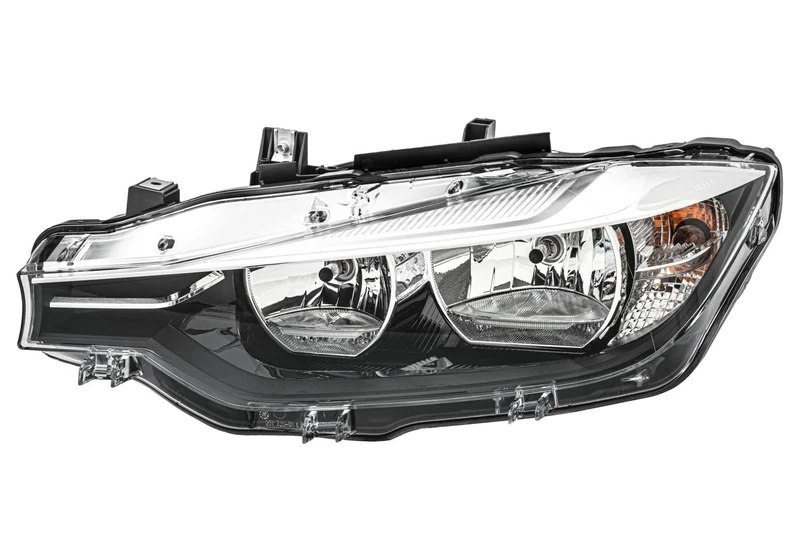 HELLA 1LG 012 101-931 Halogen/FF-Headlight - for left-hand traffic - Left Front - Image 1