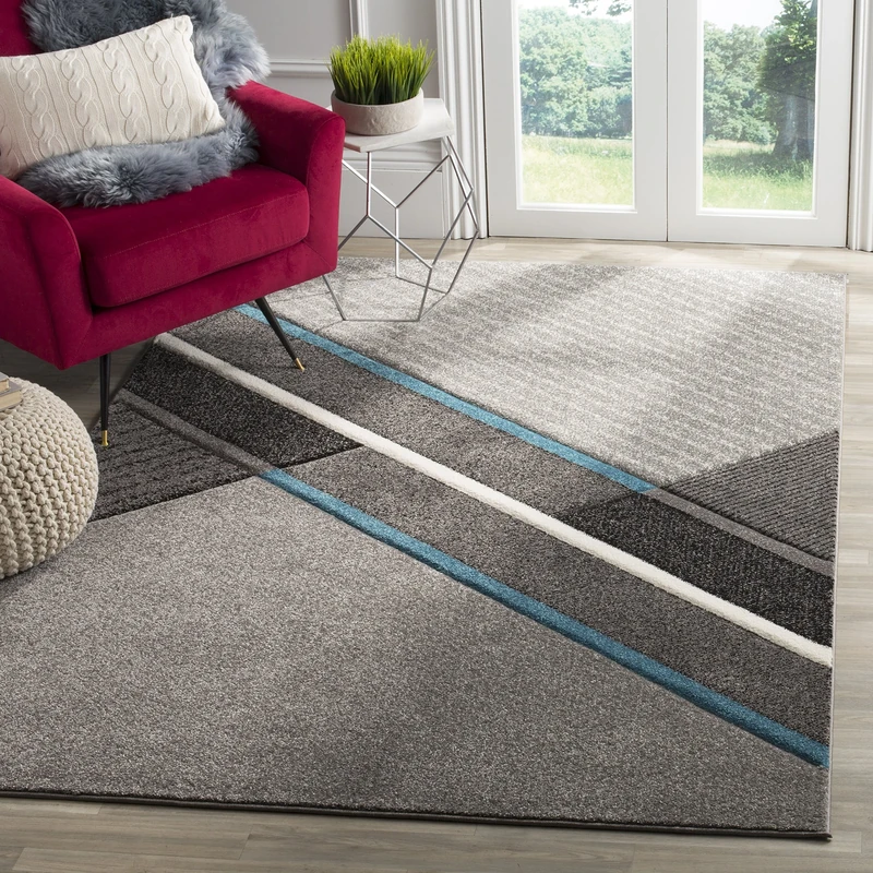Safavieh Modern Graphic Indoor Woven Rectangle Area Rug, Hollywood Collection, HLW711, in Grey/Teal, 122 X 183 cm for Living Room, Bedroom or Any Indoor Space