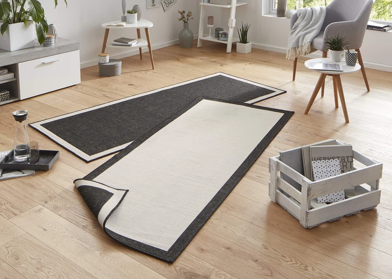 NORTHRUGS Panama Indoor and Outdoor Rug 80 x 350 cm Reversible Rug Weatherproof Modern Plain Design with Border Runner for Balcony Patio Garden Conservatory Living Room Waterproof in Black Cream - Image 1