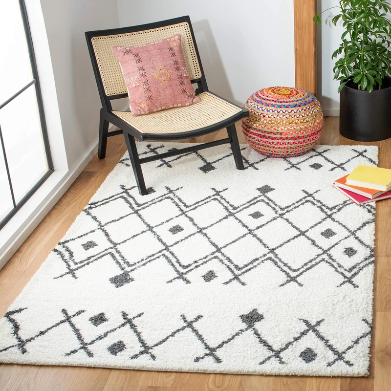 SAFAVIEH Shag Rug for Living Room, Dining Room, Bedroom - Berber Shag Collection, Short Pile, in Cream and Navy, 201 X 302 cm - Image 1