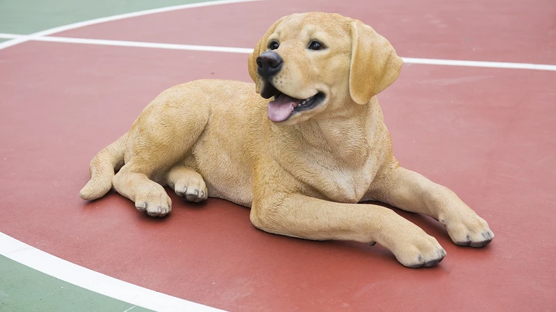 HI-LINE RUNADI Gift 87690 Decorative Labrador Retriever Lying Down Yellow Dog Statue