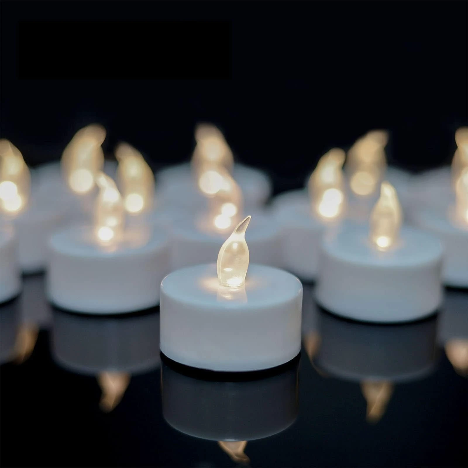 TEECOO Tea Lights LED Candles Flickering Flameless Candles 24-Pack Realistic Battery Operated Fake Candle with Warm White Bulb Light for Halloween Decoration,Festivals,Weddings etc