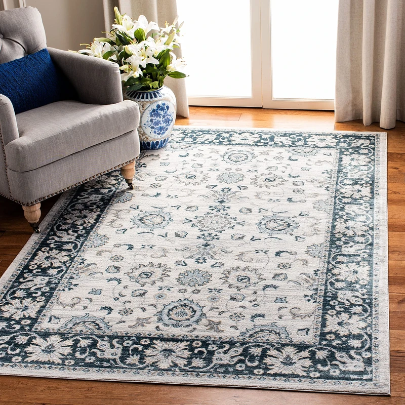 SAFAVIEH Traditional Rug for Living Room, Dining Room, Bedroom - Isabella Collection, Short Pile, in Cream and Navy, 122 X 183 cm