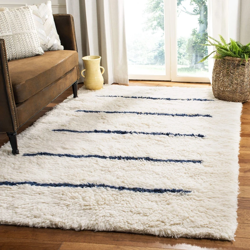Safavieh Moroccan Inspired Indoor Hand Knotted Rectangle Area Rug, Kenya Collection, KNY750, in Ivory / Navy Blue, 160 X 229 cm for Living Room, Bedroom or Any Indoor Space