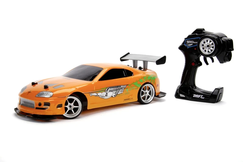 Jada Toys Fast & Furious 1995 Toyota Supra Turbo RC Drift Car with 4-Wheel Drive, 2-Channel Radio Remote Control, USB Charging Function & 4 Spare Tyres, 1:10 Scale, Orange