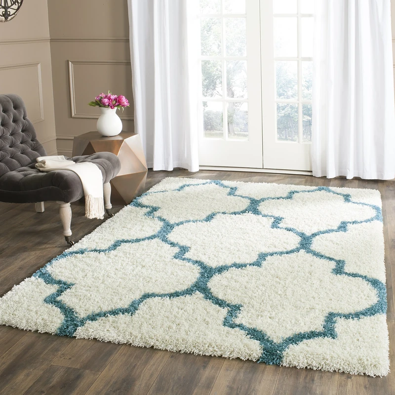 Safavieh Shaggy Indoor Woven Rectangle Area Rug, Kids Shag Collection, SGK566, in Ivory/Blue, 183 x 274 cm for Living Room, Bedroom or Any Indoor Space
