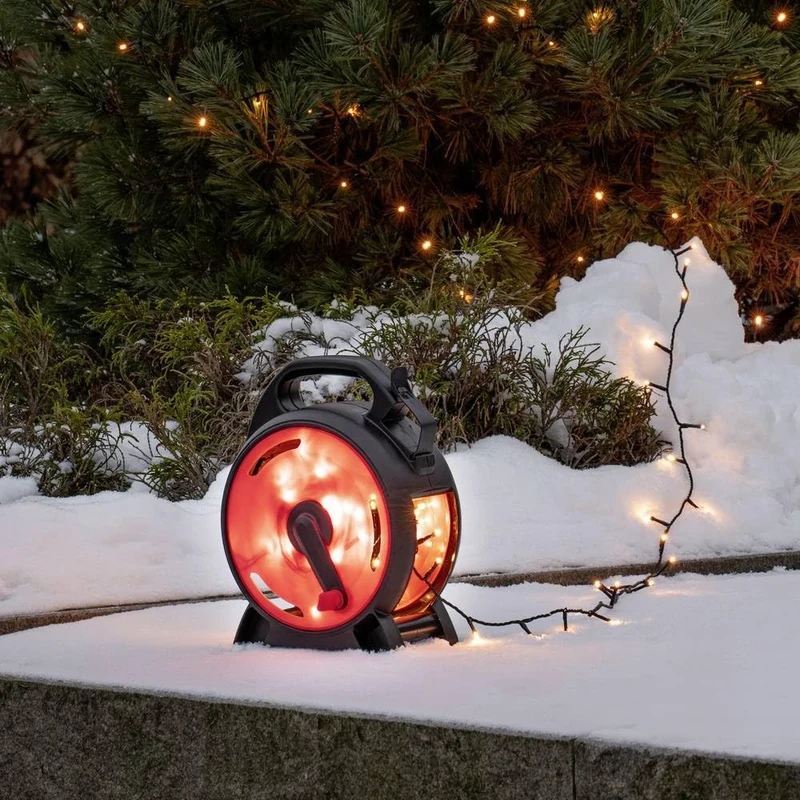 Konstsmide Micro LED Cable Reel Christmas Fairy Lights/Outdoor or Indoor (IP44) Plug in / 600 Amber White Diodes/Black Cable String Lights