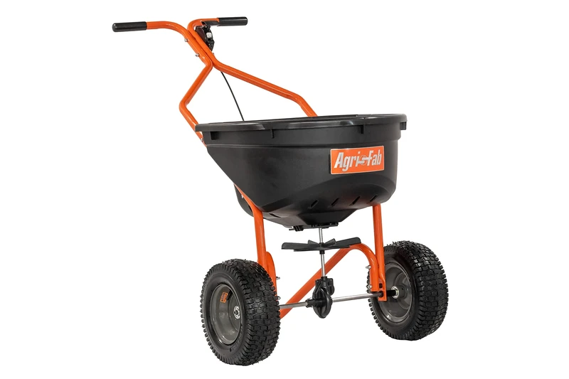 Agri-Fab 45-0576, 110lb Capacity Push Lawn Broadcast Spreader, Approximately Coverage of 1/3rd Acre (17,500 sq, 10-Ft Spread Width, Enclosed Gear Box, 12 x 4-Inch Pneumatic Tires, Black/Orange