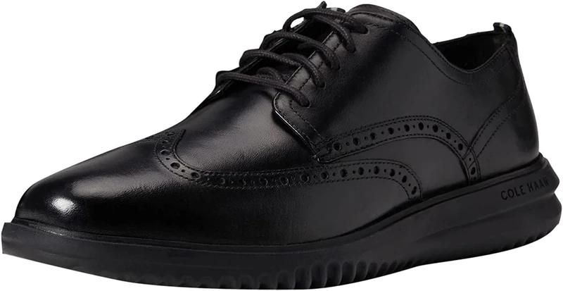 Cole Haan Men's Grand+ Wingtip Oxford, Black Leather/Black, 9
