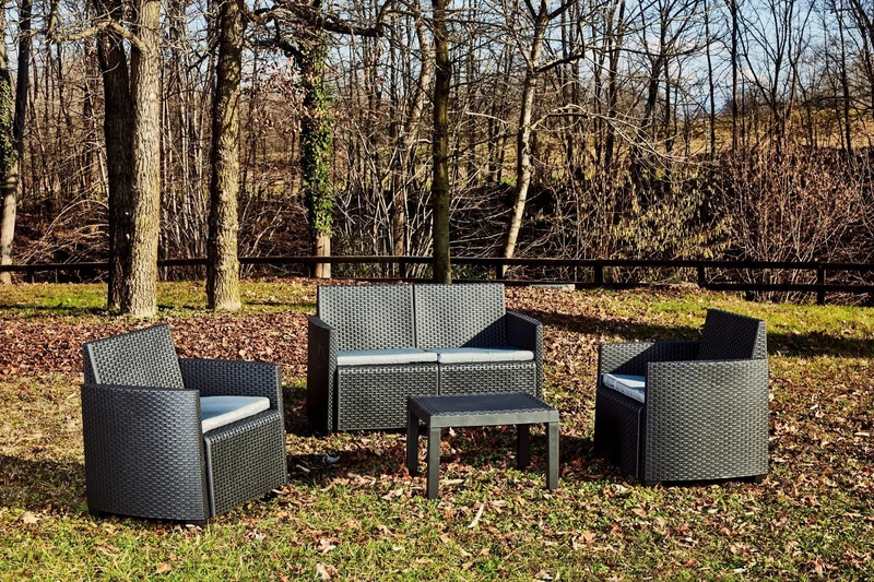 Dmora - Indoor and outdoor lounge consisting of: 2 armchairs, 1 two-seater sofa and 1 coffee table with 4 cushions, Made in Italy, anthracite color