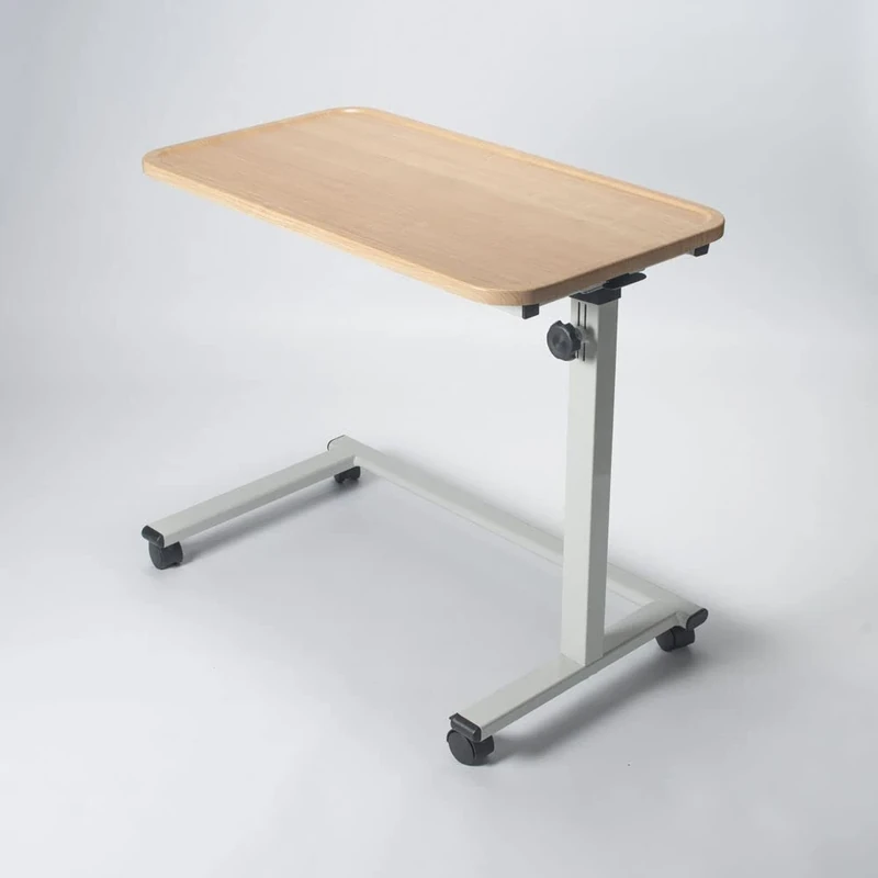 NRS Healthcare Easylift Home Height Adjustable Tilting Top Overbed Overchair Table Suitable for Chair and Wheelchairs, C Shaped Base, Supplied with Choice of castors or Slider feet, Beech Effect