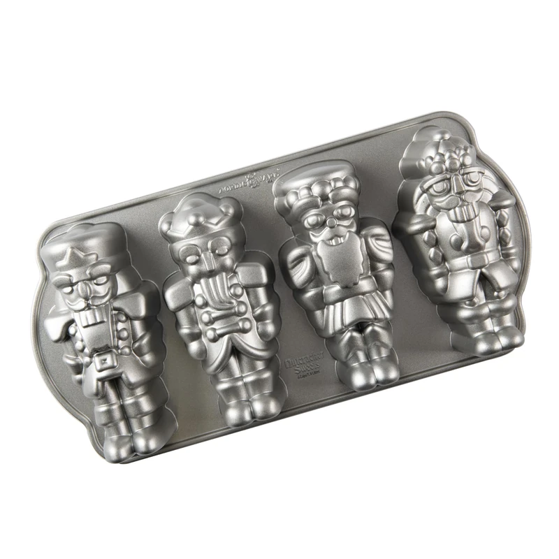 Nordic Ware Nutcracker Sweets Cakelet Pan, Christmas Baking Tin, Cast Aluminium Cake Tin, Muffin Tray for Mini Cakes, Made in The USA, Colour: Silver