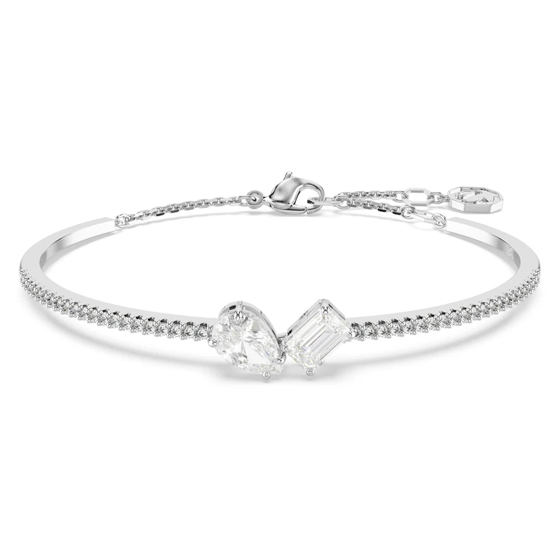 Swarovski Mesmera Moi et Toi Bangle Bracelet, Rectagular-Cut and Pear-Drop Cut Crystals with White Pavé Stones in a Rhodium Plated Setting, from the Mesmera Collection
