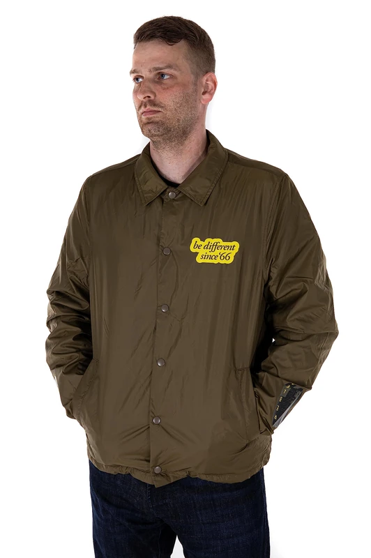 GEWA OVATION Guitars Merch VOLUME Jacket – Unisex windbreaker British Khaki – size XXL - “Be Different Since ’66” neon design – size S - recycled polyester - M-MD-J-VOL