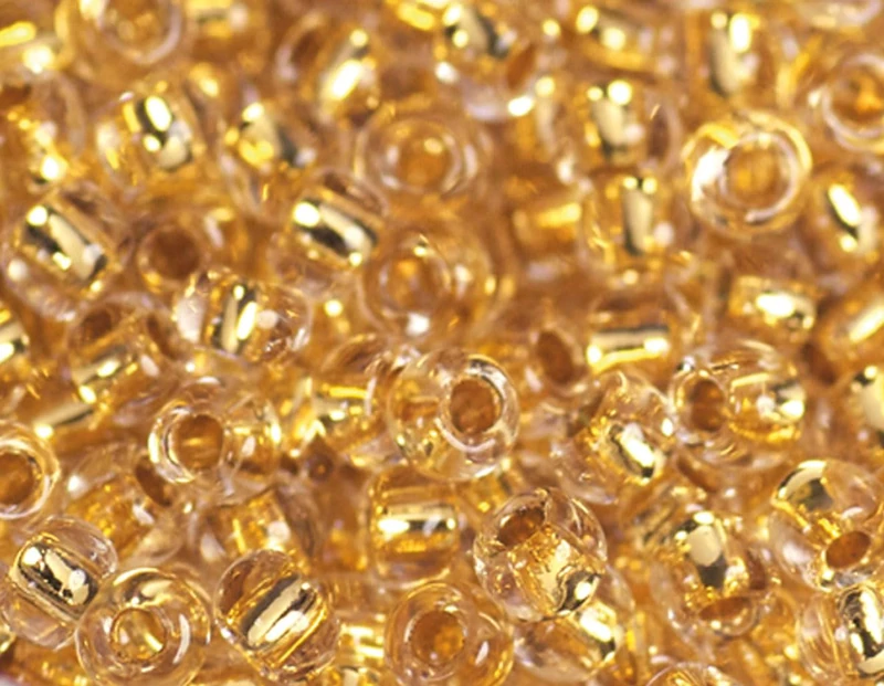 Japanese Rockalla Genuine Gold Beads 2.2mm.11/0 100g - Image 1
