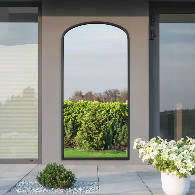 MirrorOutlet The Angustus - Black Metal Framed Modern Shallow Arched Garden Wall and Leaner Mirror 67" X 33" (170CM X 85CM) Black. 2cm Wide Frame and 3cm Deep.…