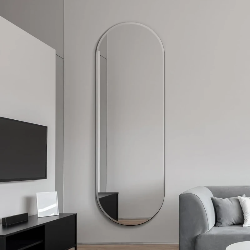 MirrorOutlet The Lacuna - Large Frameless Pond Wall Mirror 71" X 26" (180cm X 65cm) Silver Mirror Glass On A Black Backing.
