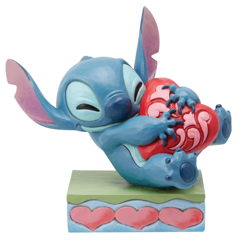 Enesco Jim Shore Stitch Hugging Heart Figurine