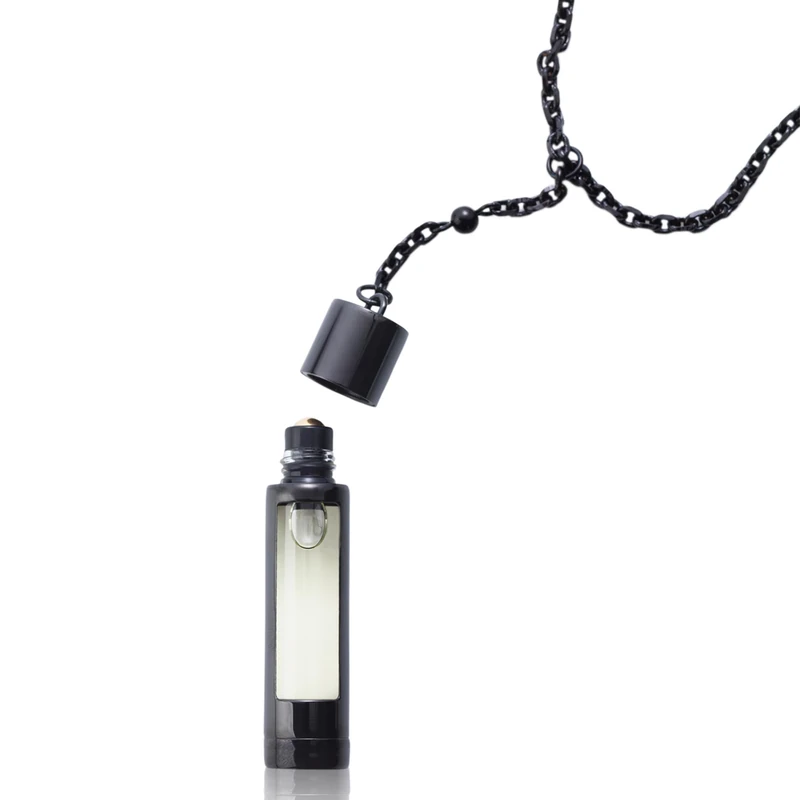 The Piece - Black by NCP for Unisex - 3 Pc 2 x 4.9ml Olfactive Facet -701 Leather and Vetiver EDP Roll On, Necklace