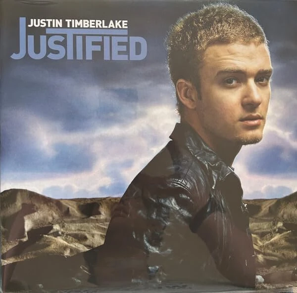 Justified (Light Blue Vinyl) [VINYL]