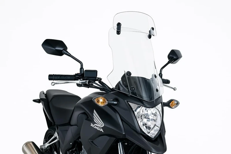 Puig 6002W Touring Windscreen with Transparent Visor designed to optimize aerodynamics, improve wind protection and offer greater comfort, stability and safety during riding on any route