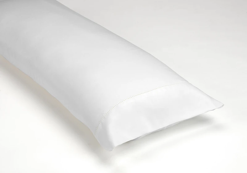 Funda de almohada de algodón orgánico colour blanco. Acabado en vainica.