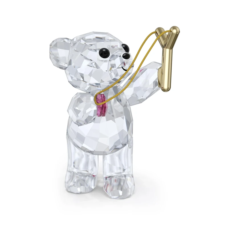 Swarovski Kris Bear Sending You Love Figurine, Clear Faceted Crystal Animal with Pink Crystal Heart and Gold-Tone Metal Slingshot, Part of the Kris Bear Collection