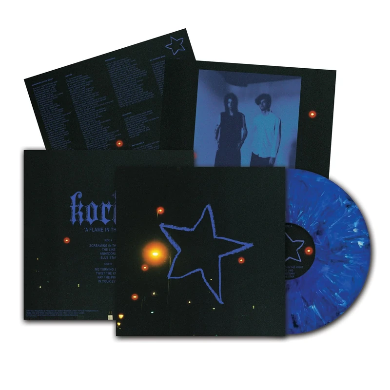 A Flame In The Dark (Aqua Blue/Cyan Swirl Vinyl) [VINYL]