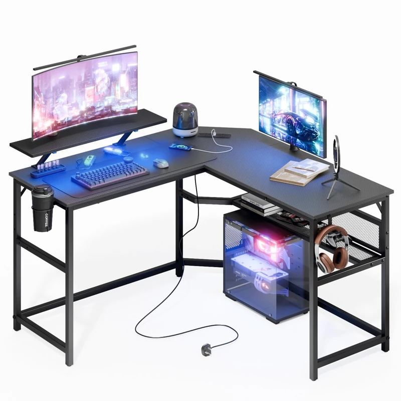 Mondeer L Shaped Gaming Desk, 130 x 130 cm Computer Desk with LED Lights 2 Power Outlets and 2 USB Ports, Reversible Corner Desk with Storage Shelf, for Home Office Bedroom, Black