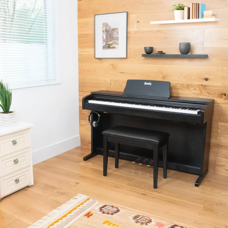 Sonix SXP9 digital piano in black satin piano style cabinet, with 88 fully weighted keys, ivory feel, 3 pedals, Bluetooth, 32 instrument voices and onboard record facility