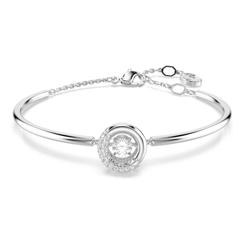 Swarovski Dextera Bangle Bracelet, Clear Round-Cut Dancing Stone and Clear Pavé Crystals in a Rhodium-Finished Setting, Part of the Dextera Collection