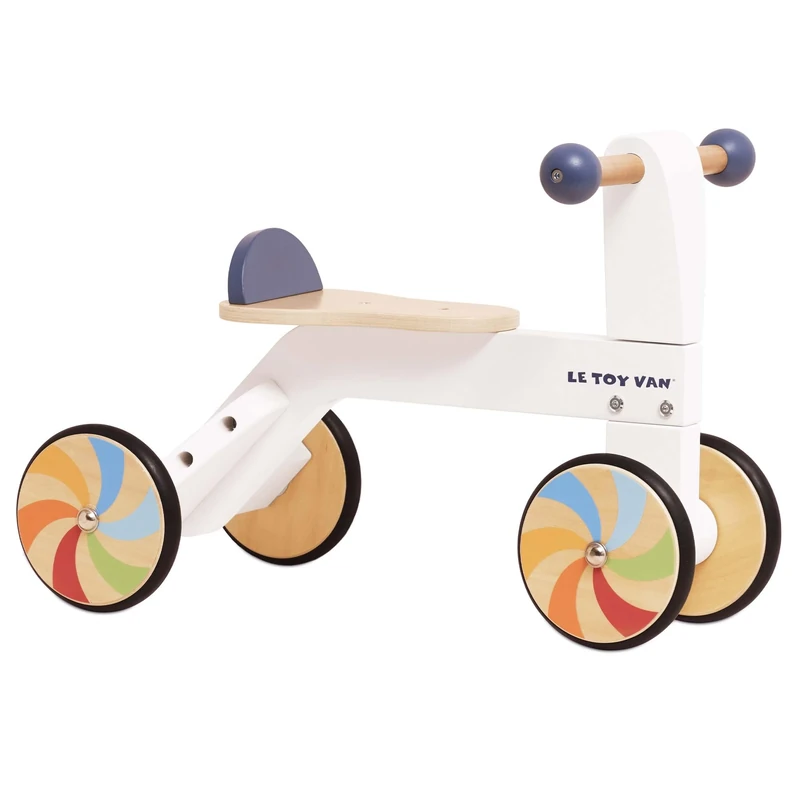 Le Toy Van Wooden Ride-On Trike – FSC® 100% Certified Sustainable Wood – White & Dark Blue Finish with Colorful Windmill Wheels – Balance & Coordination Toy for Toddlers