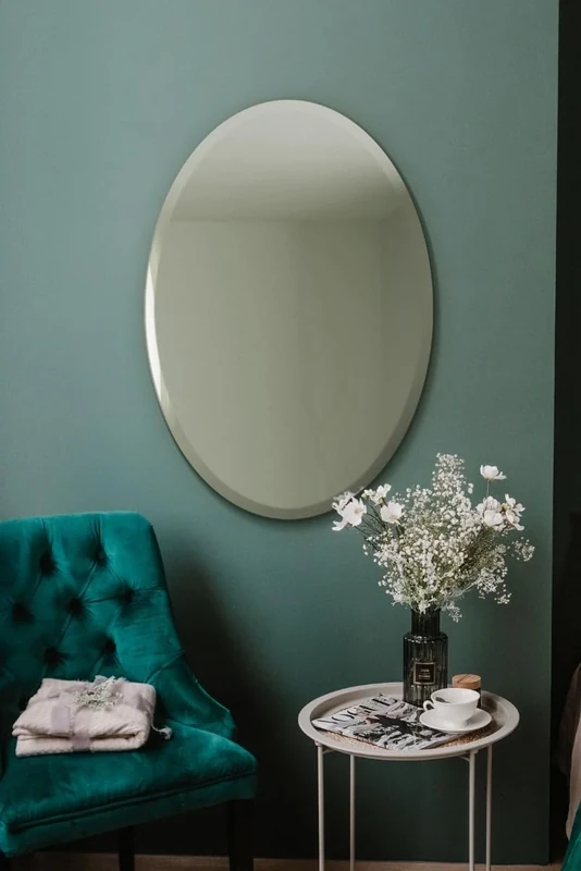 MirrorOutlet The Ovale - Large Frameless Oval Pond Bevelled Wall Mirror 24" X 16" (60cm X 40cm) Silver Mirror Glass On A Black Backing.