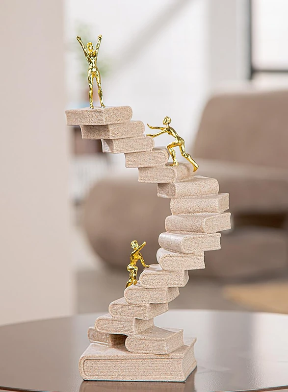 GILDE Path of Knowledge Resin Sculpture Cream Metallic Stone Look Book and Person Shape 30cm High 15cm Wide 10cm Deep