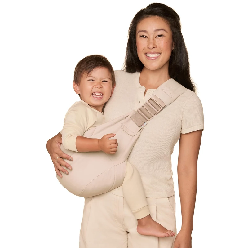 Ergobaby Upsie Sling Baby Hip Carrier, Ergonomic Hip Carrier for Babies and Toddlers from 6 Months (7.7-20.4 kg), Spontaneous Switching Between Walking and Being Carried, Natural Beige