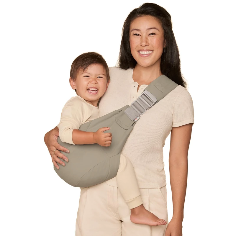 Ergobaby Upsie Sling Baby Hip Carrier, Ergonomic Hip Carrier for Babies and Toddlers from 6 Months (7.7-20.4 kg), Spontaneous Switching Between Walking and Being Carried, Soft Olive - Image 1